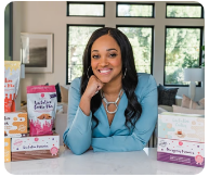 Milky Mama founder with her products
